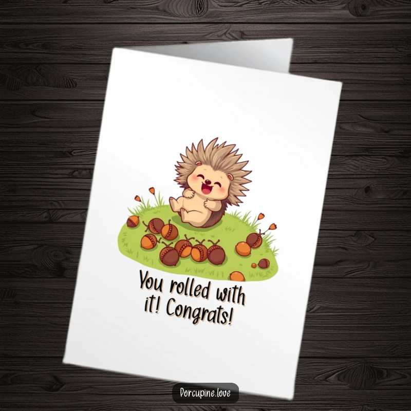 Funny Free Printable Congratulations Card: A cute porcupine character joyfully rolls down a grassy hill with acorns, celebrating a win.